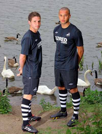 Swansea City 2010 - 11 Home and Go shirts